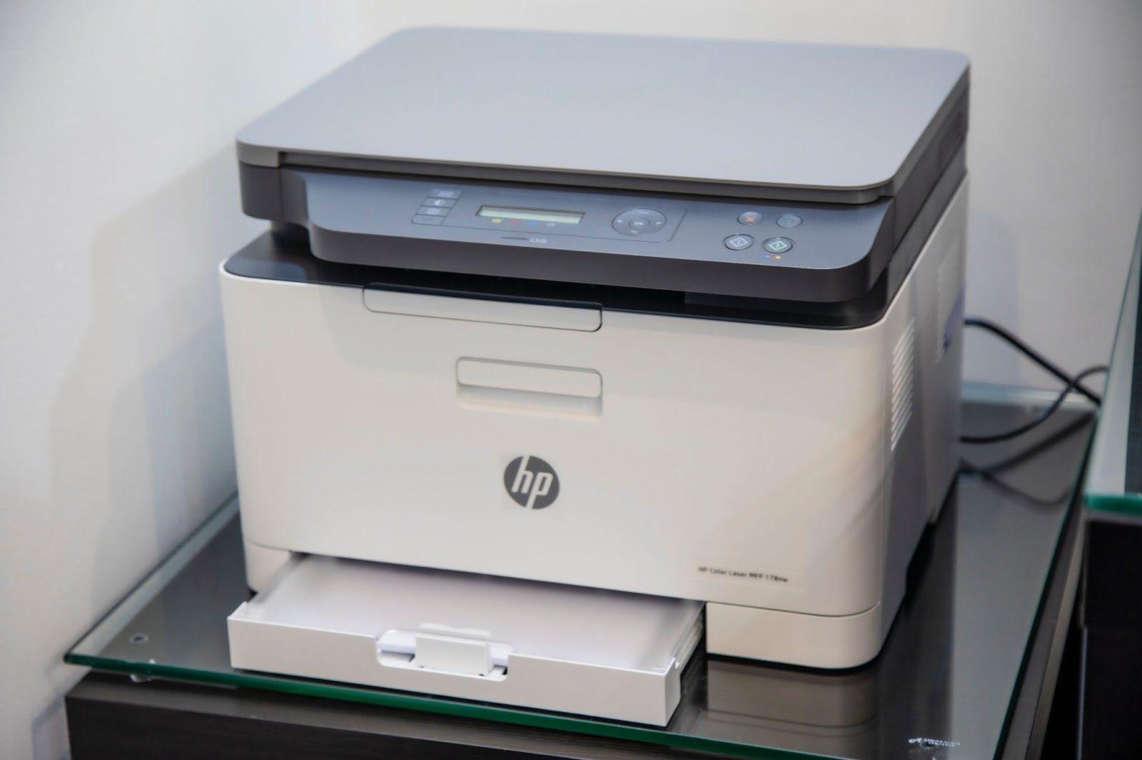 A white HP laser printer perfect for your home office upgrade.