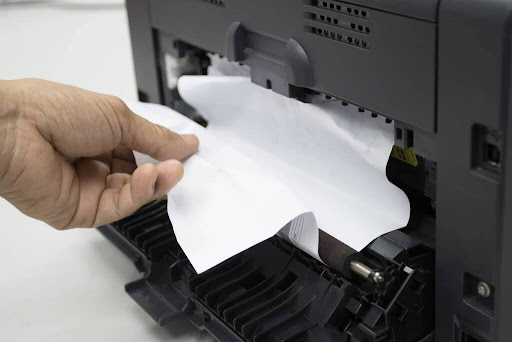 A paper jam issue in a printer.