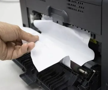 A paper jam issue in a printer.